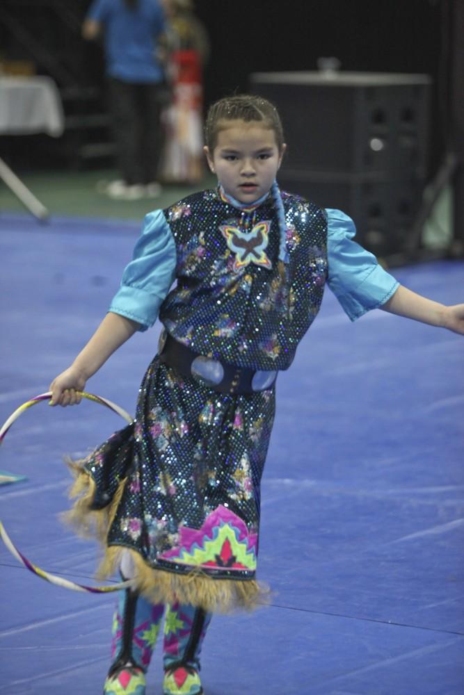 Guests were invited to watch and participate in traditional Native American dances during the
Spring Pow Wow in the Fieldhouse Arena. A raffl e and silent auction were also among festivities.