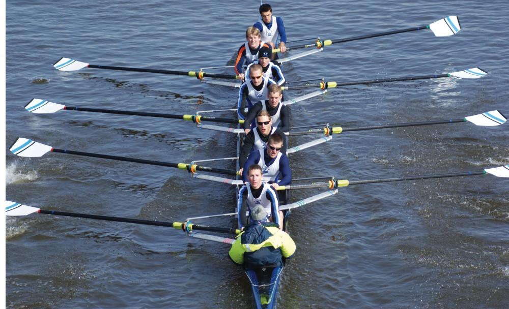 The varsity men row in an earlier regatta. They placed third in Lubbers Cup Regatta in Spring Lake.