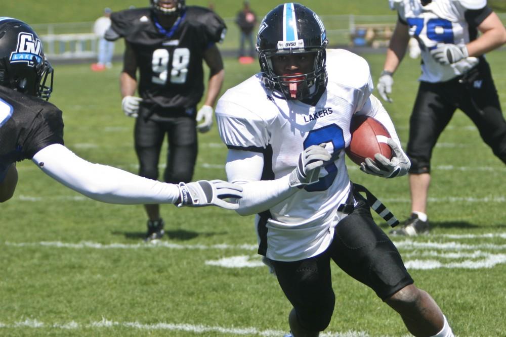 Freshman Norman Shuford blows past defenders during the GVSU Spring Game.