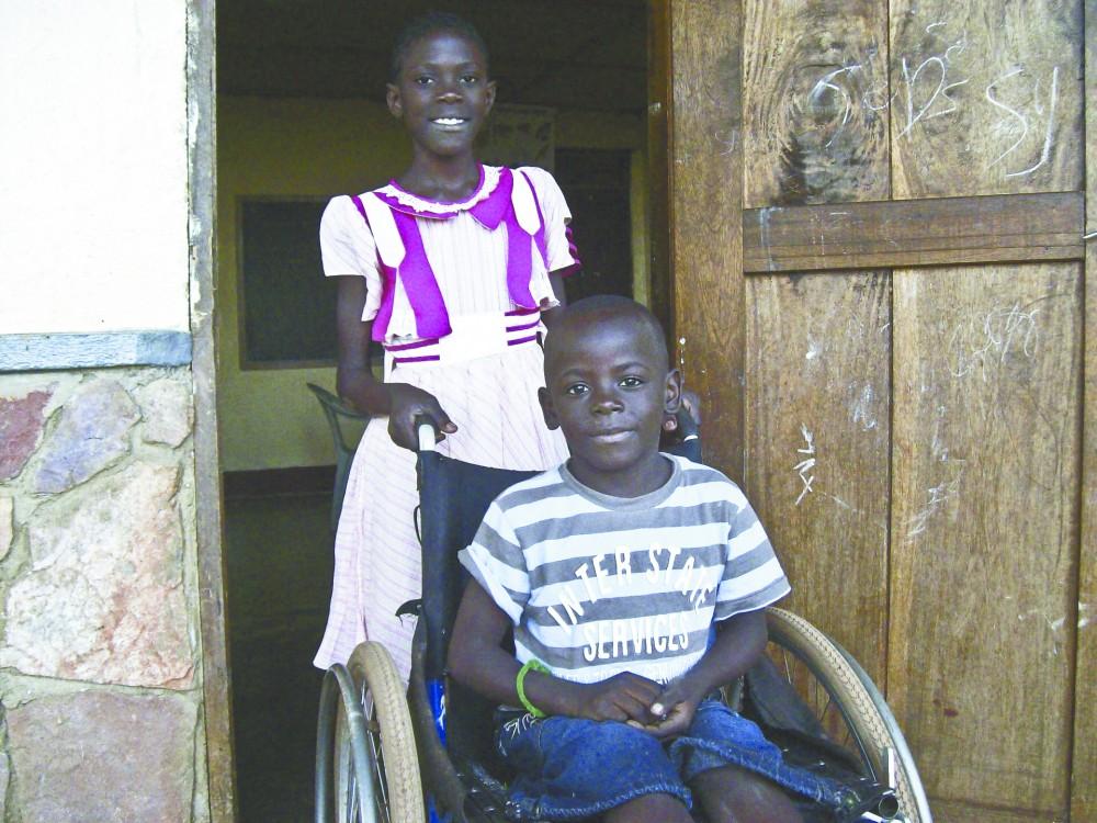 	Courtesy Photo / Ken VanderWal
A child receives medical treatment at Ken VanderWal’s Ugandan orphanage.