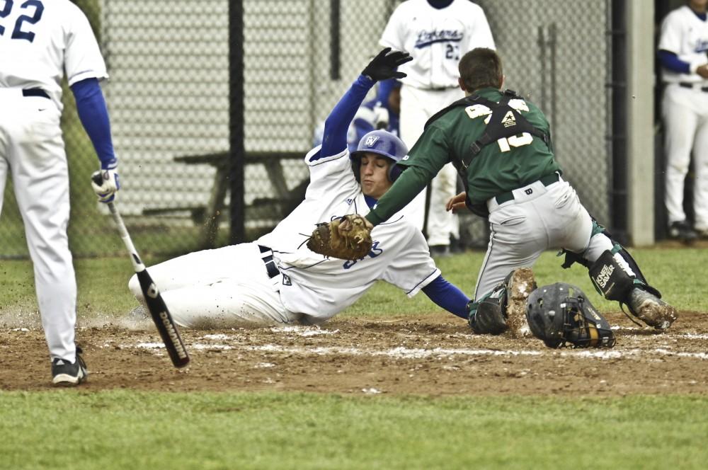 GVL Archive / Andrew MillsGrand Valley State University freshmen Steve Anderson is tagged out at home during Tuesday