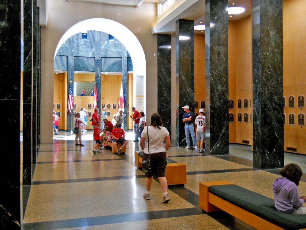 Tourists fill the plaque gallery at the Baseball Hall of Fame in Cooperstown, NY.