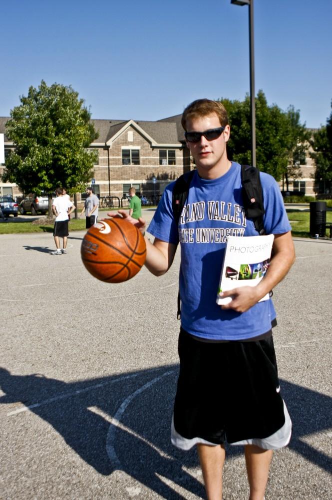 Michael Stave has to balance both his schoolwork and his intramural basketball.