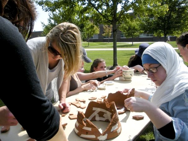Courtesy Photo / Ashley Taylor
Student reconstruct pottery during an Archeology Week event