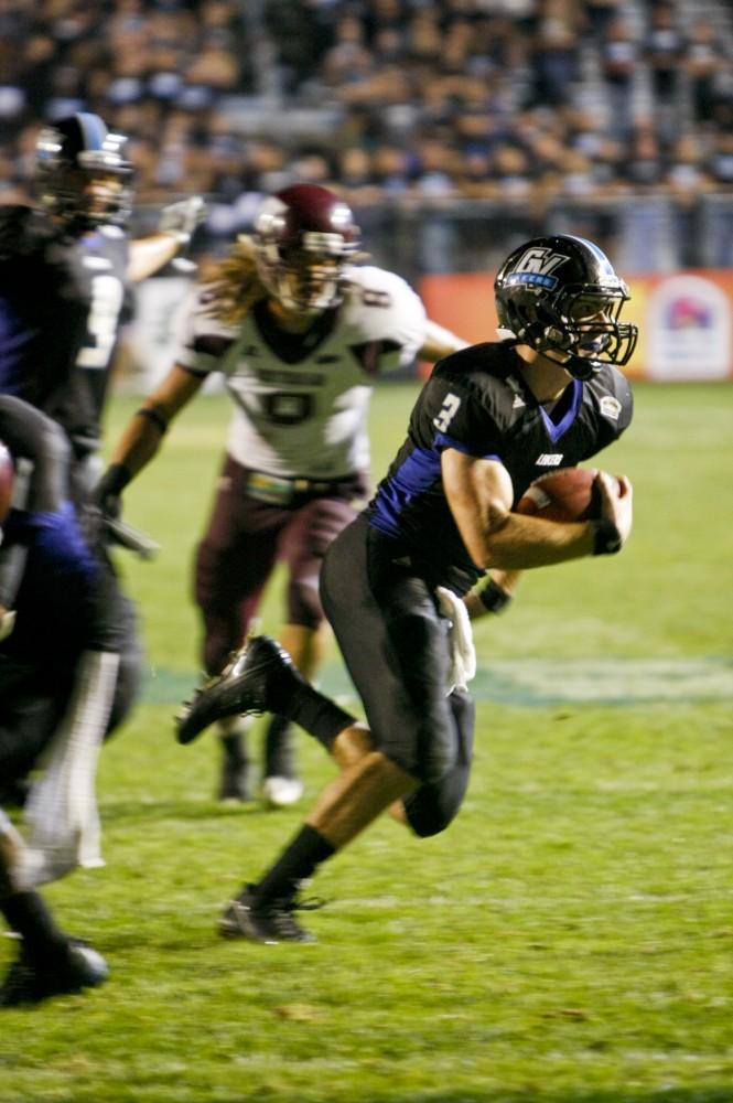 Kyle McMahon runs the ball into the end zone for Grand Valley's final touchdown during Saturday's game against West Texas A&amp;M