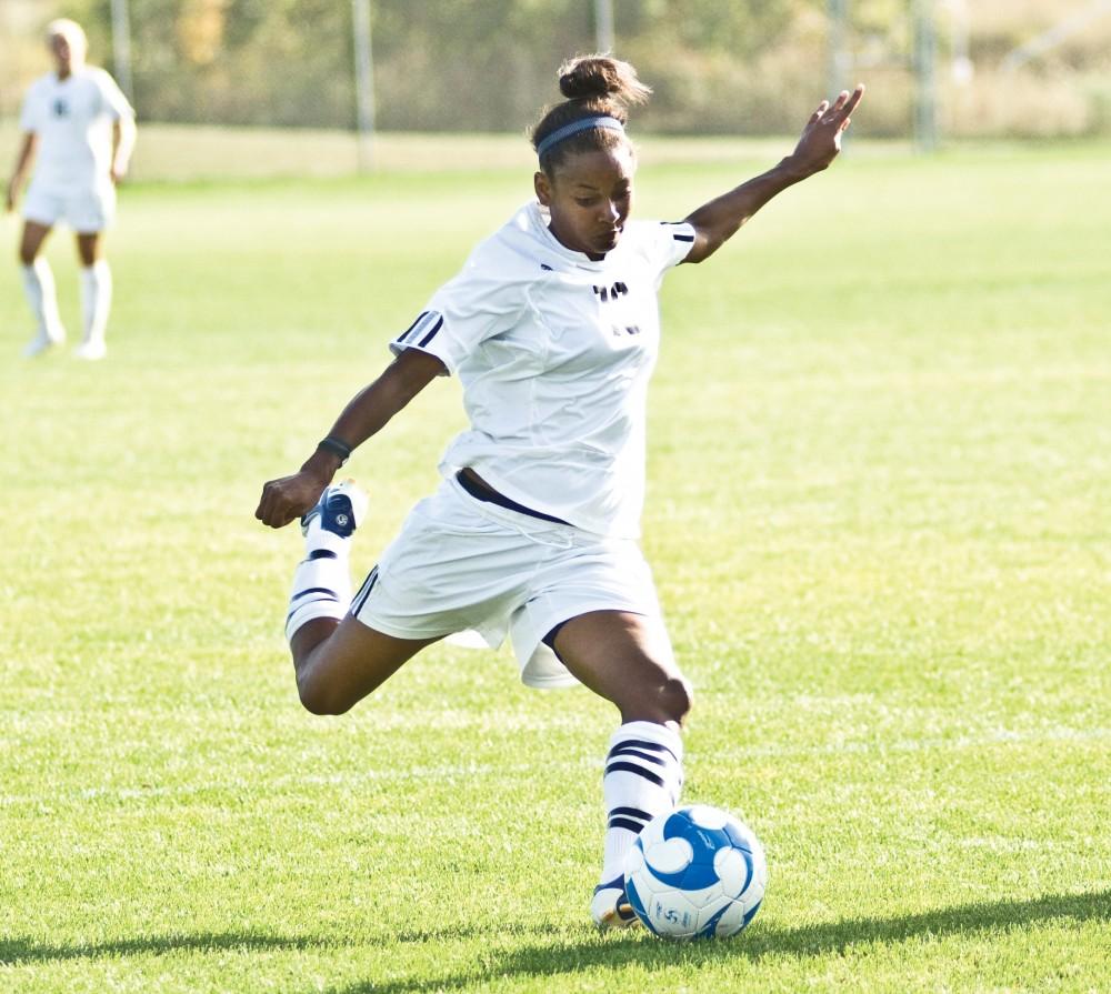 Grand Valley State University senior forward Irie Dennis takes a shot on goal during Friday’s home game against Northern Michigan University. The Lakers defeated Northern 4-0 with goals scored by Dennis, Jaleen Dingledine, and Ashley Botts.