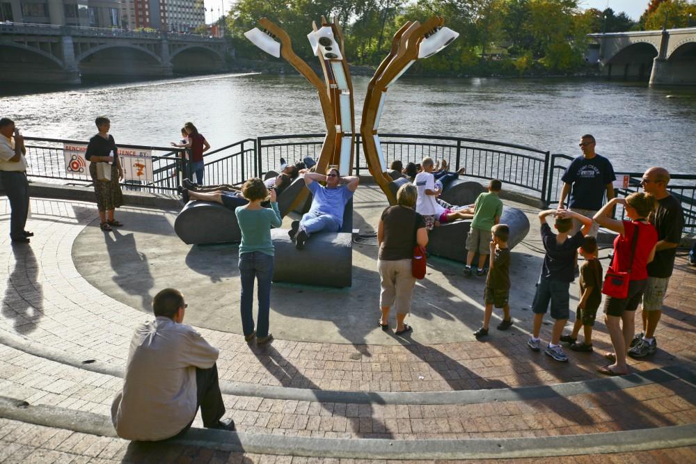 Residents and visitors of Grand Rapids enjoy one of the Art Prize installations