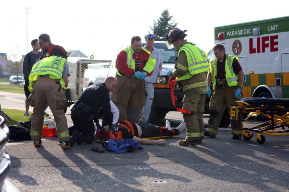 GVPD helps the victim as Fire and Rescue arrive on scene