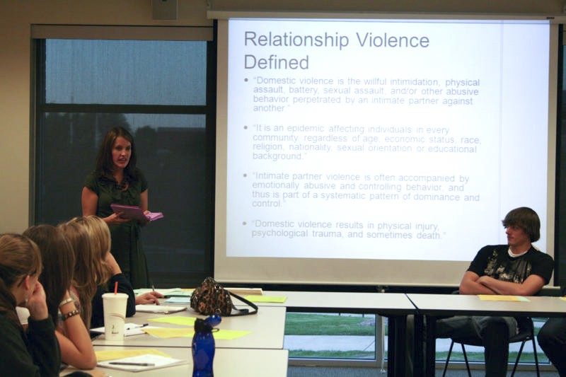 Rachael DeWitt talks about domestic violence during the Behind Closed Doors event