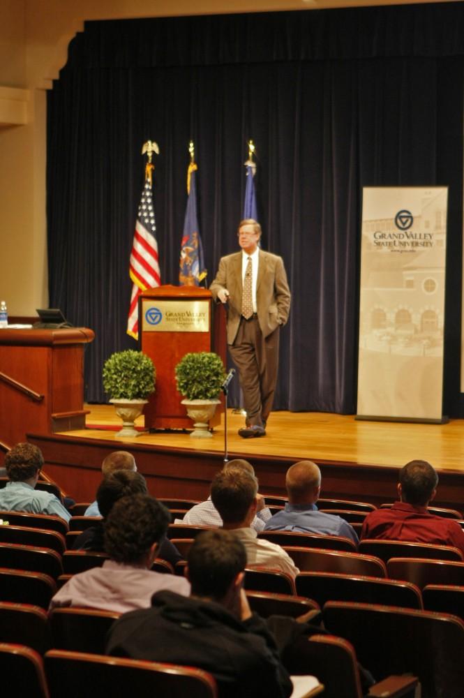 Deputy Oakland County Executive Robert Daddow informs students about Michigan's economic crisis.