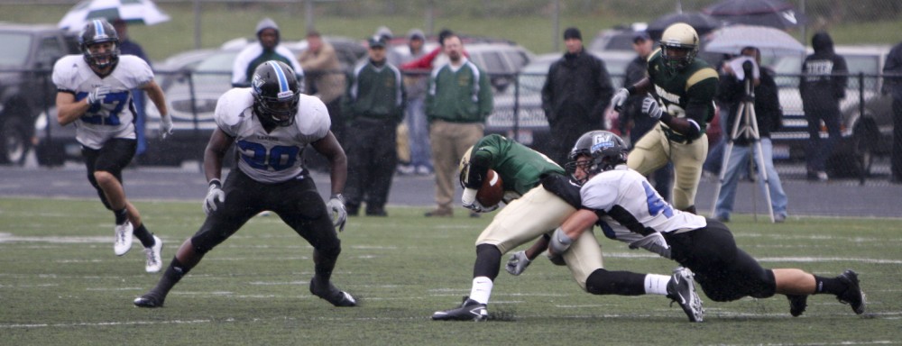 Laker defense brings down the Tiffin ball carrier during Saturdays game.