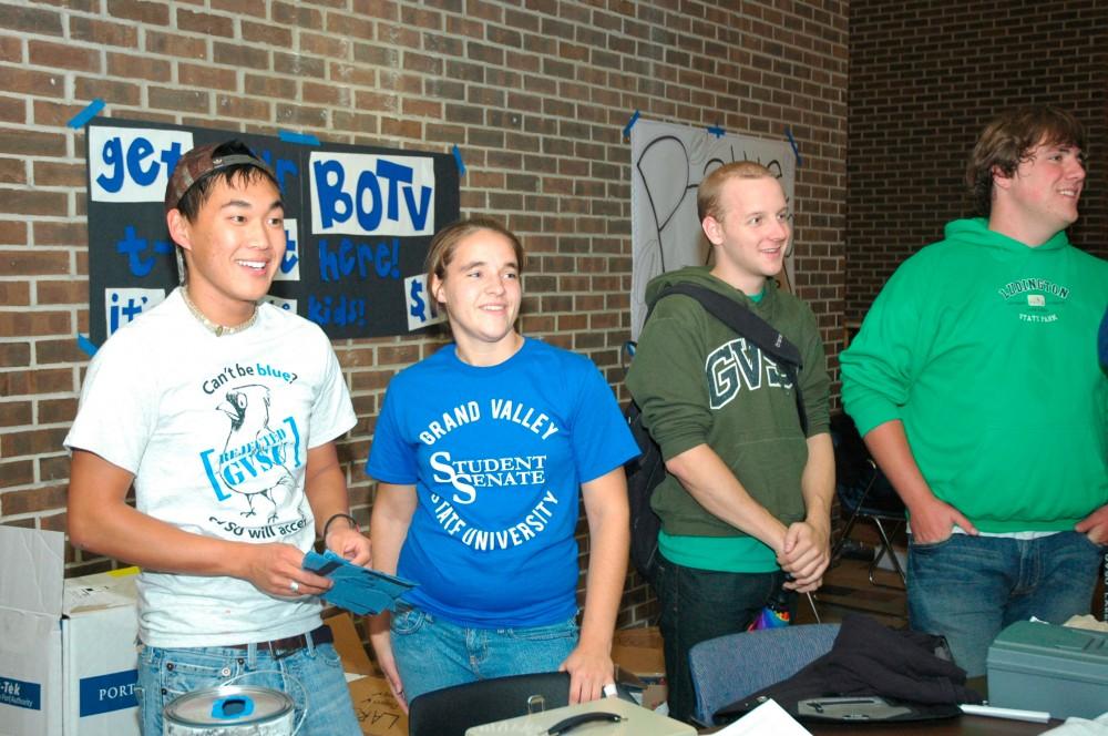GVL Archive /Lindsey WaggonerBOTV: Students (from left to right) Ryan Workman, Autum Trombka, Miah Koeph, and Tom Zoppa try to raise support for Battle of the Valleys. They handed out hotdogs on Monday and tried to get students involved in the battle.