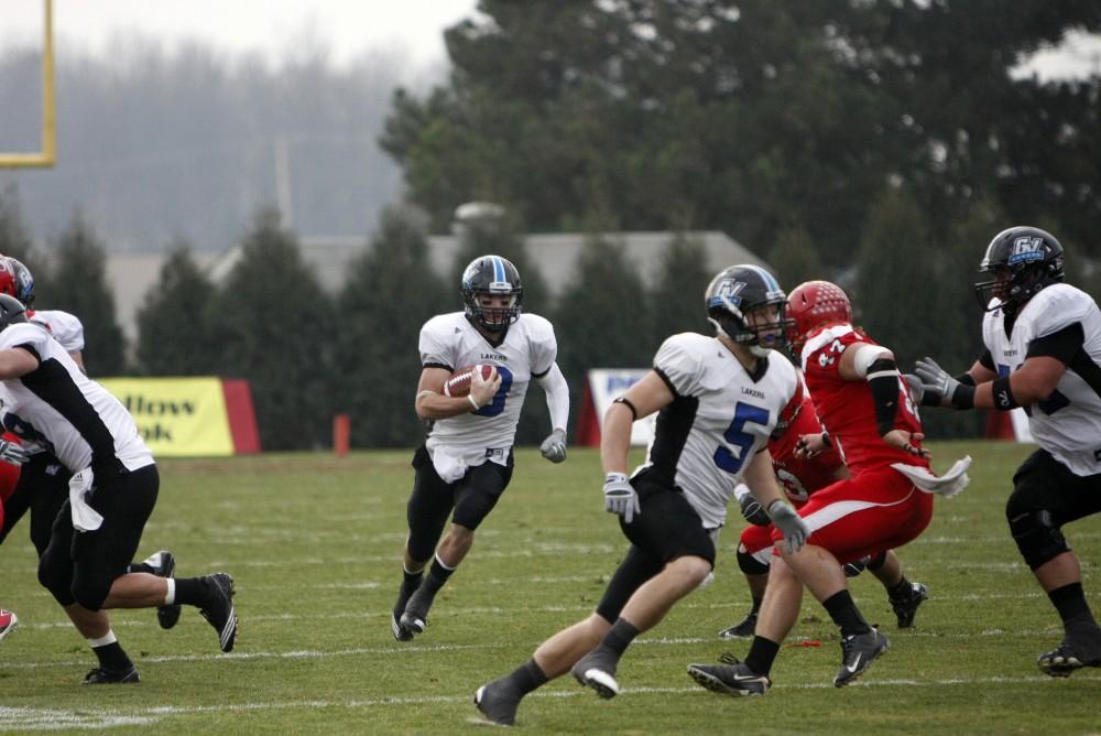 Kyle McMahon runs the ball up the field during the past game against Saginaw Valley