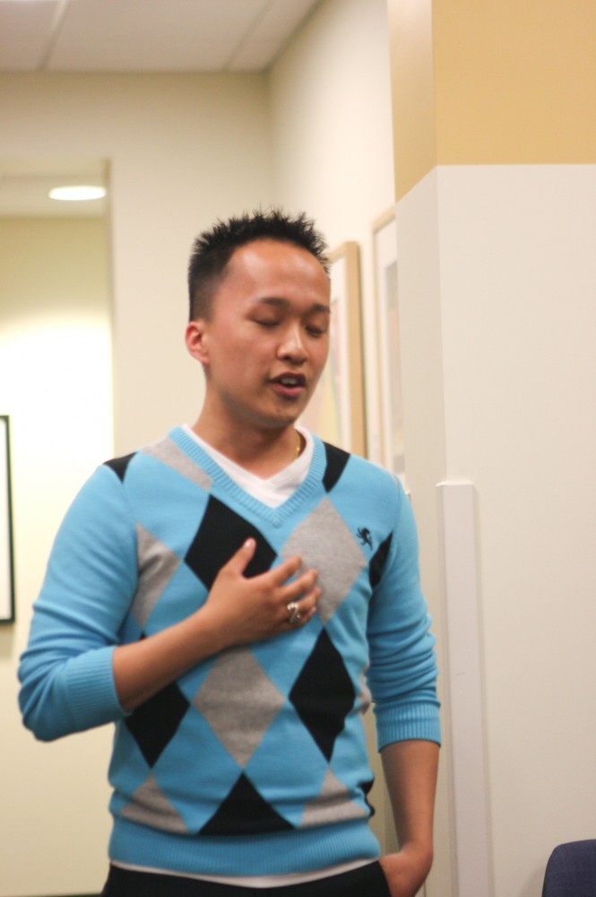 GVL / Eric Coulter
Bee Yang sings a traditional Hmong song during the WTHmong! event held in the Office of Multicultural Affairs