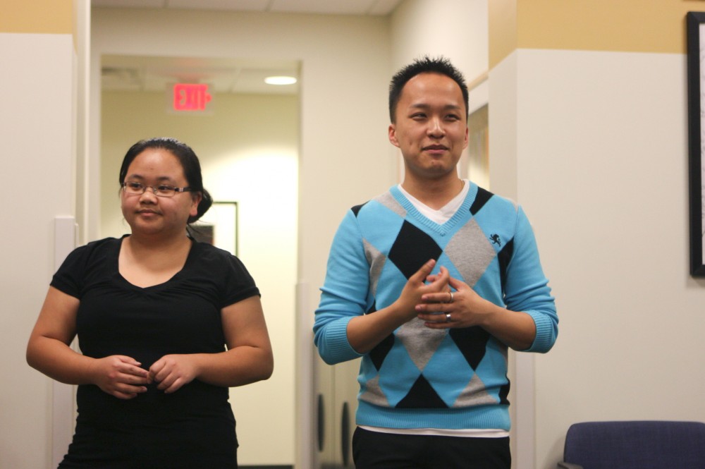 GVL / Eric Coulter
Jennifer Xiong and Bee Yang discuss the culture of the Hmong people.