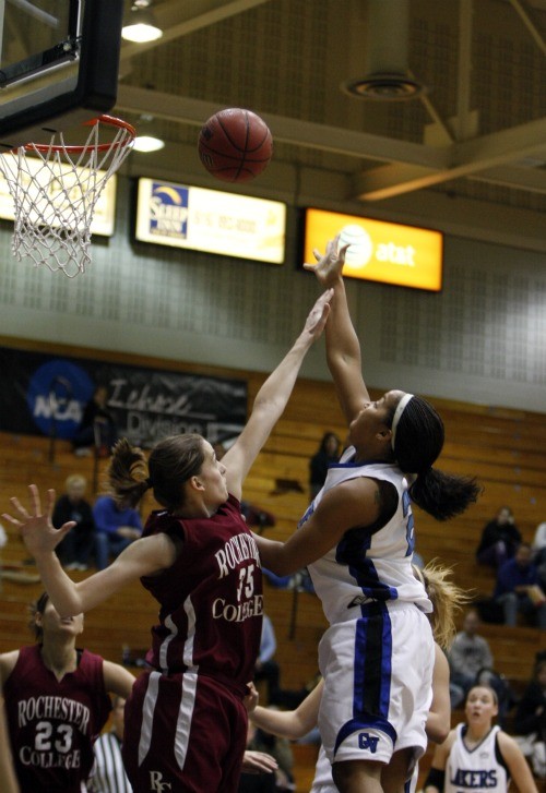 GVL / Cody Eding
GVSU sophomore guard Brittany Taylor puts up a shot over Rochester College's Sam Tomaschko in the first half of Tuesday's game.