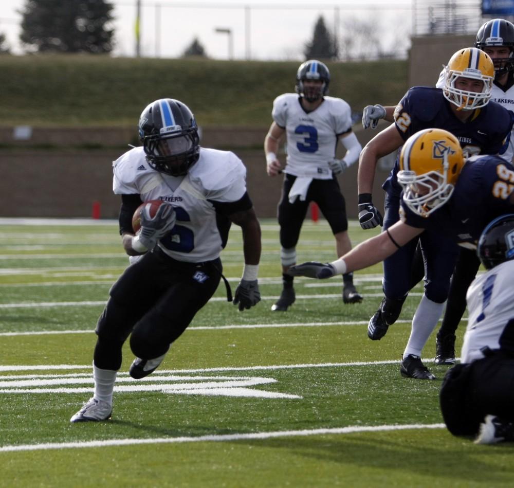 Sophomore running back runs against Augustana College during the second round of the NCAA playoffs.