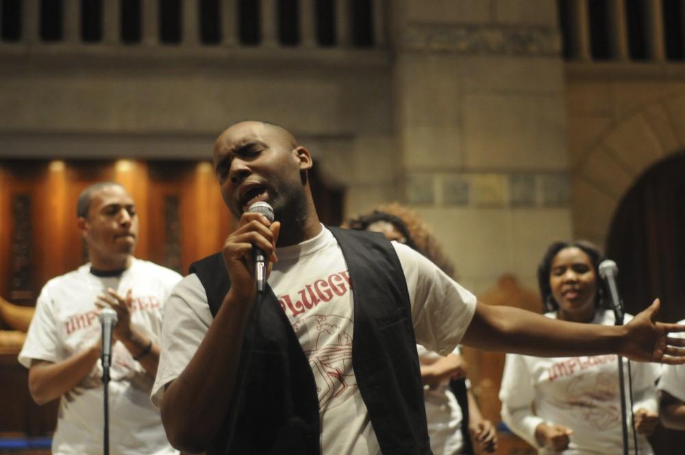 Robert McFletcher sings during Saturday’s choir concert tilted Restoration: Unplugged to Get Plugged In.  Performers from schools all over the state sang at Fountain Street Church in downtown Grand Rapids.