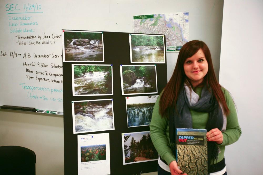 Katie Sexton, president of the Student Environmental Coalition, poses for a photograph at Save the Wild Up hosted by the SEC