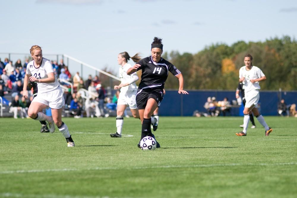 GVL Archive / Nicole Lamson
Alyssa Mira keeps the ball away from defenders during the National Championship game