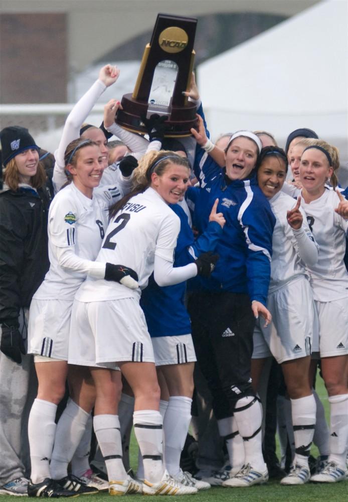 The women's soccer team celebrates their second national title