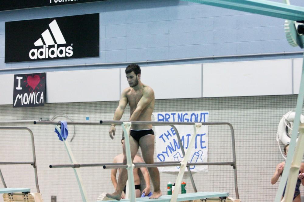 GVL Archive / Eric CoulterSophomore Kyle Gebraad begins his dive