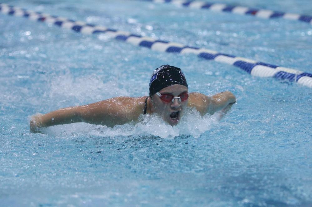 GVL Archive / Eric Coulter
A member of the womens swim team participates in a race