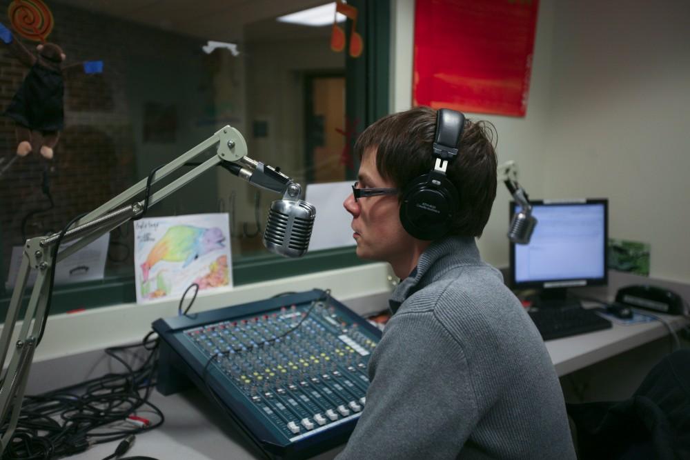 Tom Hardy, program director for The Whale, uses the equipment in the Whale studio