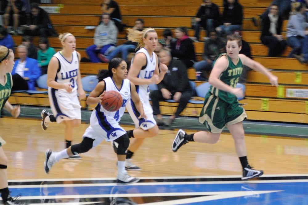 Junior guard Jasmine Padin dribbles down the court during the Lakers game against Tiffin University last Saturday.