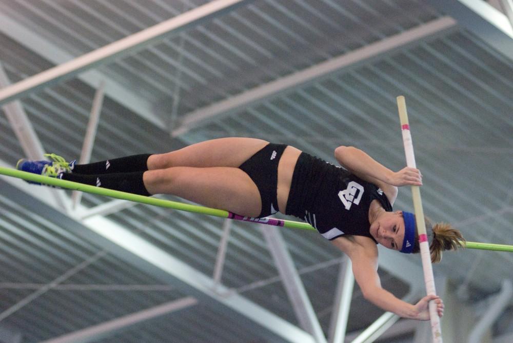 Emily McKerchie vaults during a past meet at the Laker Turf Building. 