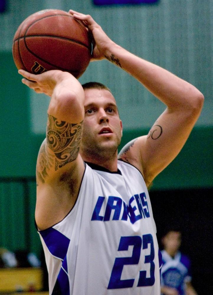 Senior K'Len Morris looks at the basket before his shot during Saturday's game against Lake Superior State. The Lakers were victorious 76 - 38.