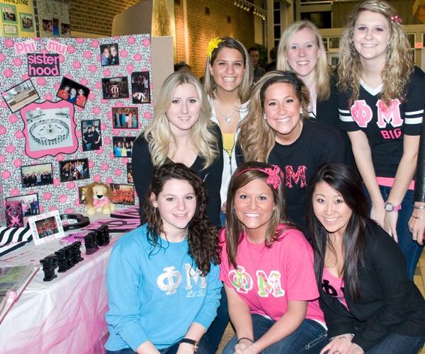 Members of Phi Mu pose for a photograph during Meet the Greeks