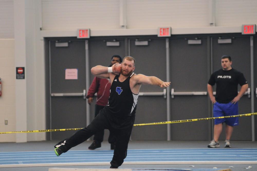 Sophomore Donny Stiffler participates in the shot put during the Bob Eubanks Open held in the Laker Turf Building.