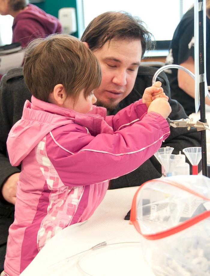 Dad helps out at Super Science Saturday