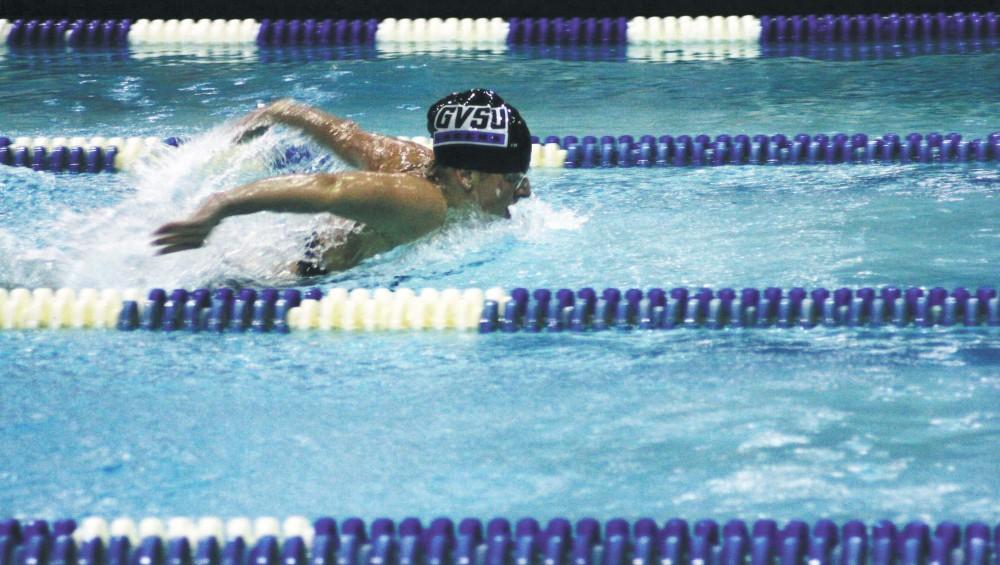GVL Archive / Kim Miller
Carly Bush pulls ahead during the womens 200 yard butterfly. Bush was recently named the GLIAC and CollegeSwimming.com National Swimmer of the Week, along with teammate Jordan Schrotenboer.