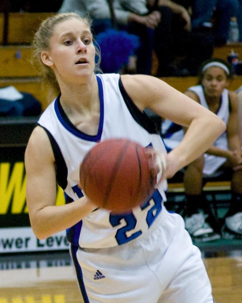 Senior Kristen Eible passes the ball during Saturdays game against Lake Superior State. The womens team suffered a 79 - 72 defeat during overtime
