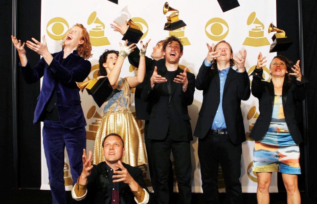 Courtesy Photo / windsorstar.com
Arcade Fire celebrates the win of Album of the Year by throwing their Grammys in the air