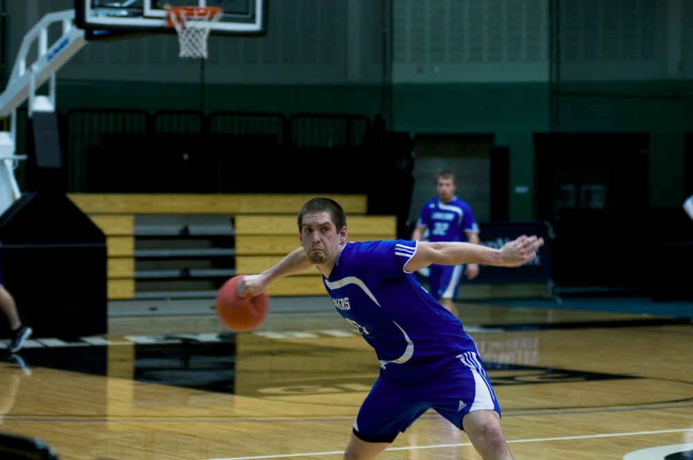 Senior Lenny Reinart throws a ball during the CMU vs GVSU dodgeball game. The Lakers lost 0-3