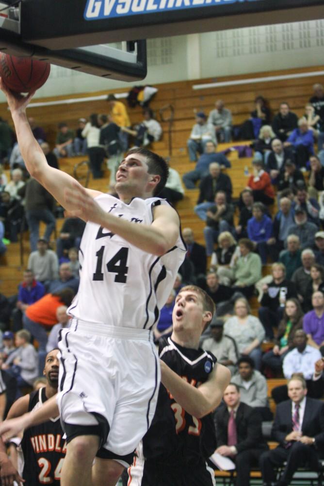 Justin Ringler attempts to add two more points to the score during THursday's game against Findlay. The Lakers came out on top with a 72 - 66 win.