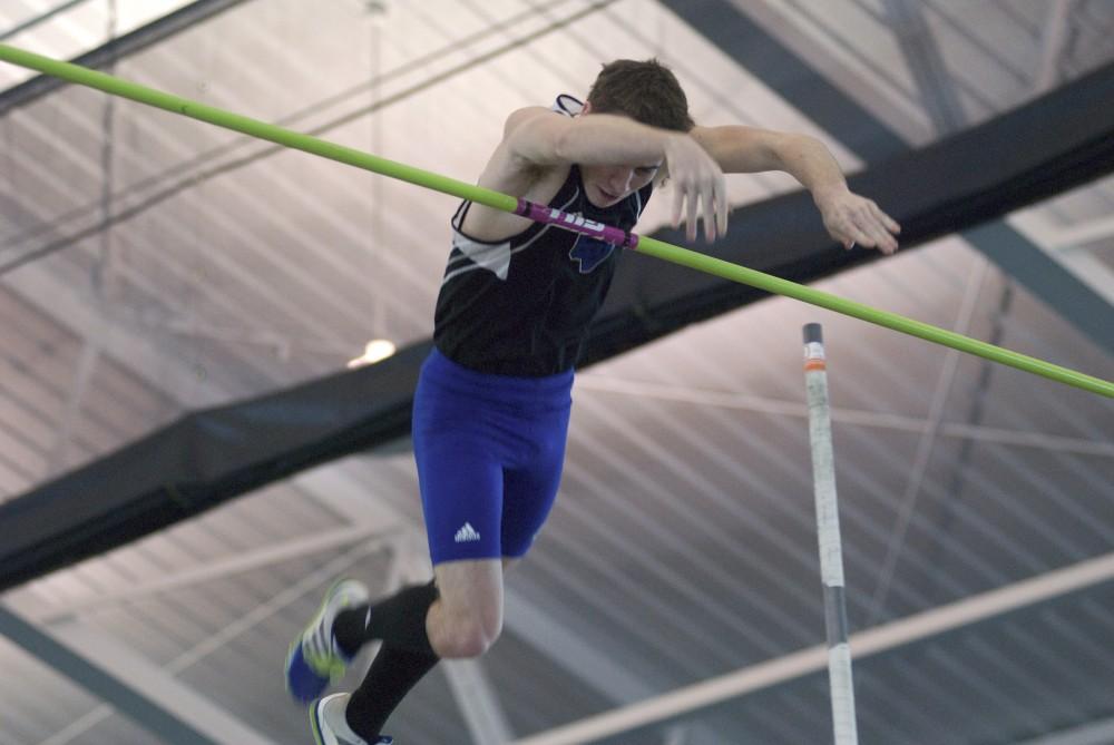 GVL Archive / Andrew MillsGrand Valley junior Travis Fisher competes in the pole vault during last years GLIAC Indoor Championships.