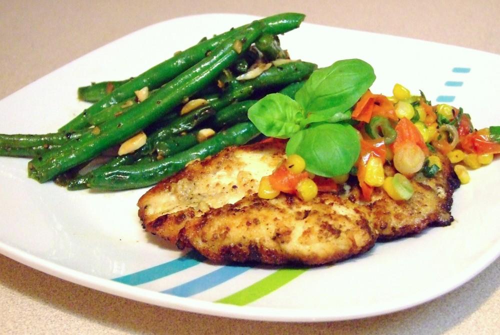 Mustard crusted chicken topped with roasted corn and tomato salsa. Served with garlic sauteed green beans.