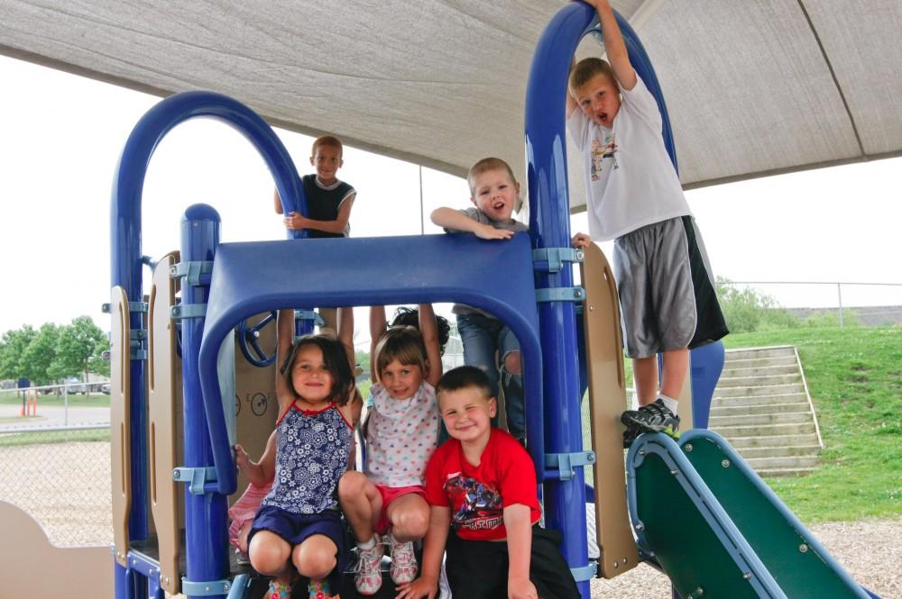 GVL Archvie / Eric Coulter
Kids enjoy the playground at GVSU's Children's Enrichment Center. With the help of the reinvestment fund, the Enrichment Center will purchse non-disposable dinnerware to help become more sustainable and to save aproximately $3300 per year.