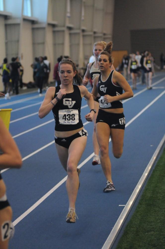 Grand Valley’s Ashley Botham and Madie Rodts (L-R) competes in the women’s mile run during Friday’s “The Big Meet” held in Allendale, Michigan at the Turf Building.