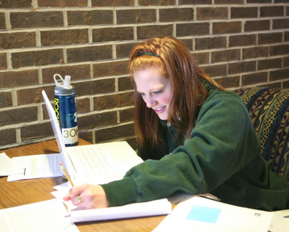 Junior Brittany Obetts works on writing a paper. Due to recent changes in the genearl education program, Brittany will no longer have to take Writing 305.