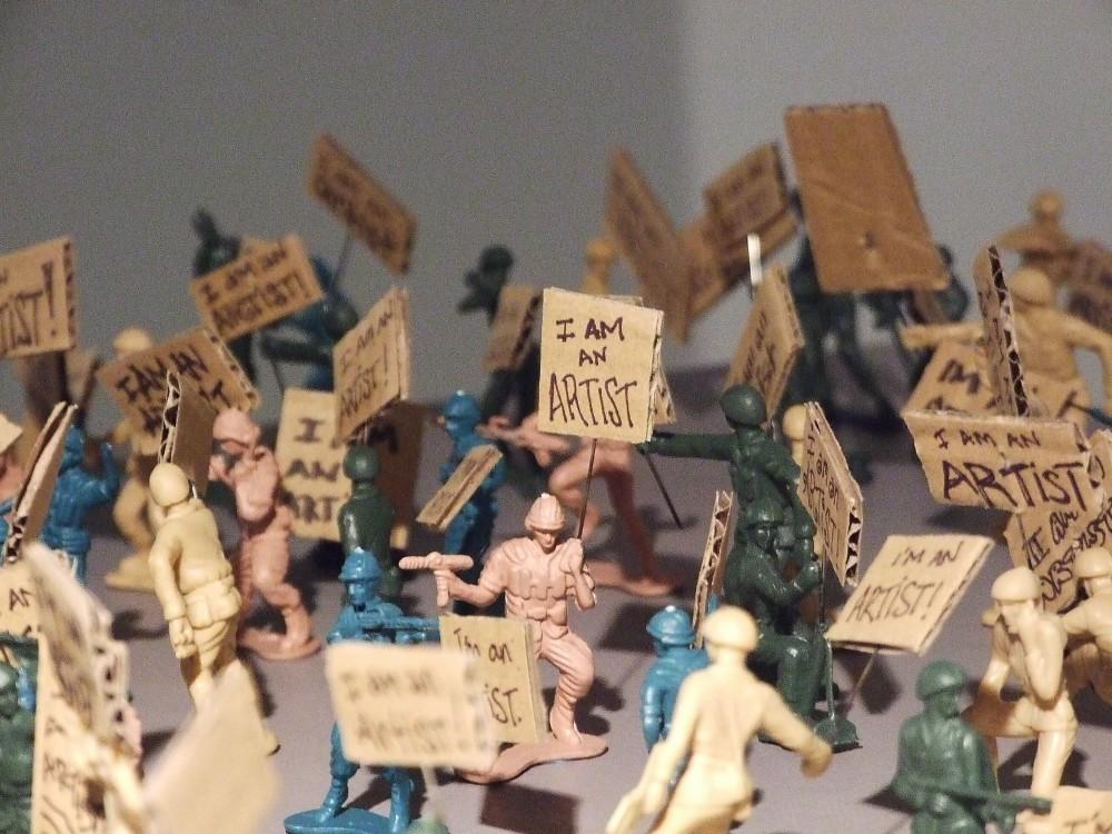 In this Civic Studio exhibit, toy soldiers represent artists on a cultural battlefield