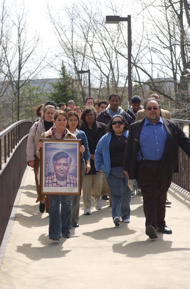 GVL Archiev / Kyle A. HudeczStudents and faculty march in silence during a past Cesar Chavez celebration on the GVSU campus          