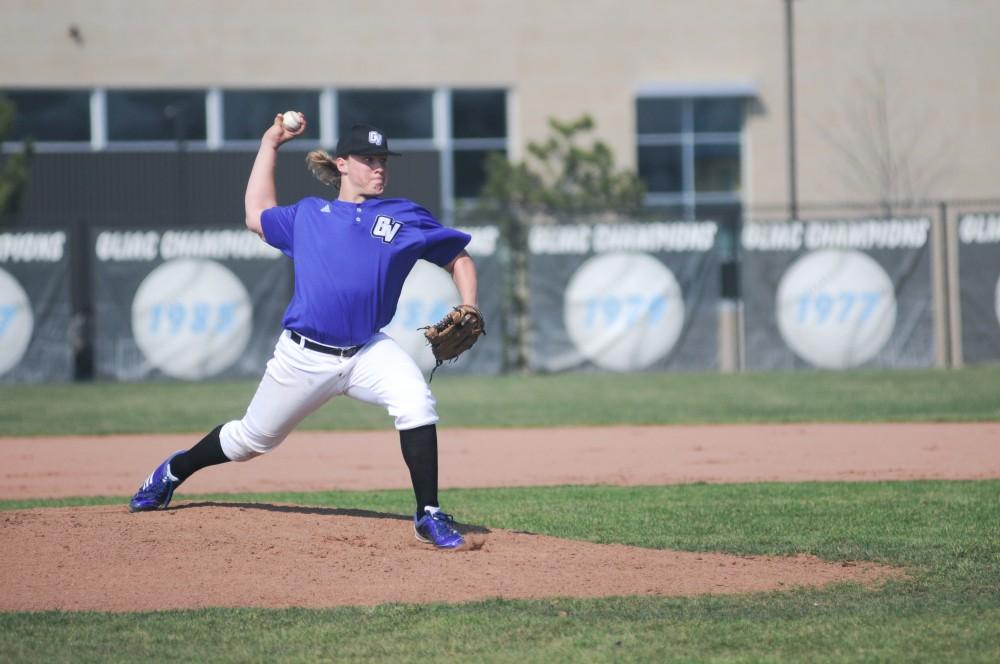 Grand Valley pitcher Kyle Schepel throws a pitch during the second game of Saturdays double header at home in Allendale. The Lakers split the pair of games with Saginaw Valley.