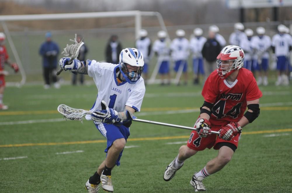Grand Valley Men’s lacrosse player Jack Dumsa plays during Saturday’s home game against rival Dayton University.