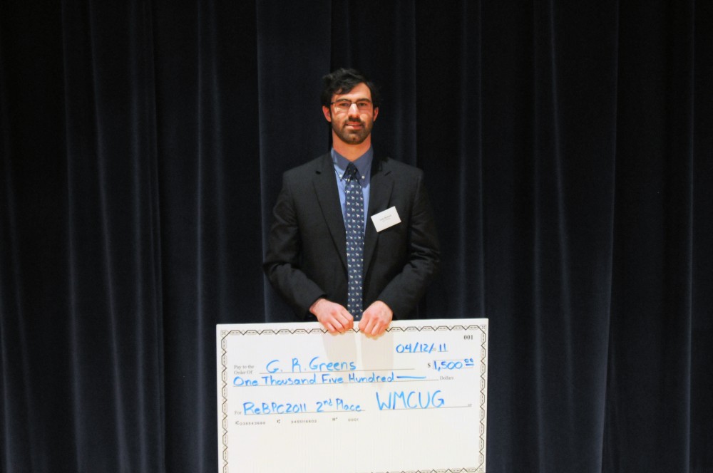 Luke Richard, second place winner of the 2nd Annual Regional Business Competition, holds his check after the awards ceremony.