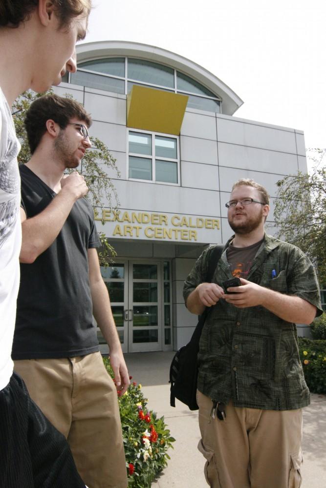 GVL/Andrea Baker
Art students Nick Freeman, Spencer Santa Coloma and Joe Chaney pass the time before class at the Calder Art Center.